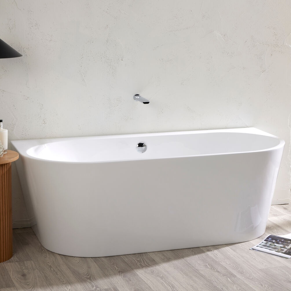 close up of avoriaz freestanding back to wall bath with chrome circular overflow